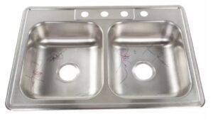 Un évier de cuisine autographié par Tool est mis aux enchères au profit du Ronnie James Dio Stand Up And Shout Cancer Fund